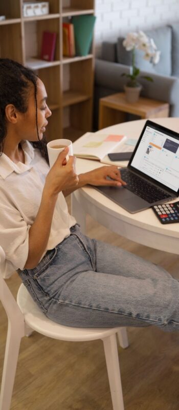 high-angle-woman-working-laptop